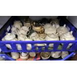 Two crates containing teapots china etc - crates to be returned