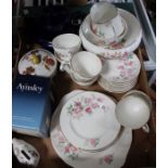 A box containing a selection of Duchess china wares
