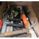 A box of builders hand tools hammers etc