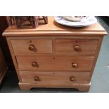 An old pine chest of two over three drawers