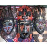 Three carved wood African tribal masks two with applied bead work - Felix Dennis collection