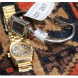 A small Gucci wrist watch with a Rado gold plated similar watch