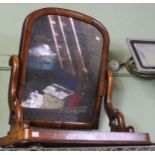 A Victorian swing dressing table mirror with heavily silvered plate