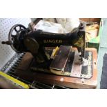 A wooden cased Singer sewing machine