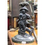 A cast metal doorstop - one man and his dog