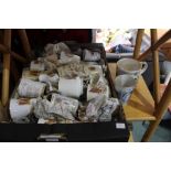 Box of commemorative mugs etc