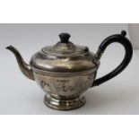 Aaron Lufkin Dennison, A silver tea pot, Birmingham 1932, weight, (including non silver handle and l