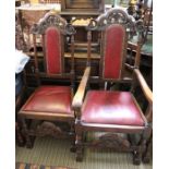 A set of six oak framed dining chairs, with red seats & back pads, carved decoration, comprising