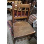 Four oak dining chairs