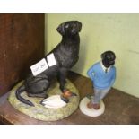 "Ready to Retrieve" porcelain model of a black lab and a Labrador golfer