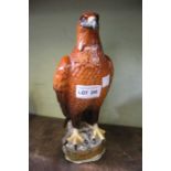 A Beswick Beneagles golden eagle scotch whiskey decanter with contents