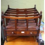 A late 19th century mahogany Canterbury of typical form and construction
