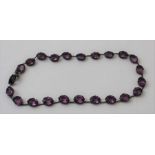 An Edwardian amethyst silver mounted choker necklace, 35cm long, gross weight 19.7g