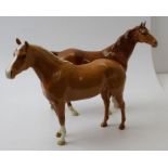 Beswick large chestnut horse with a large palomino