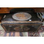 A carved camphor wood chest