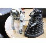 A black Dalek and the first monkey in space table top models