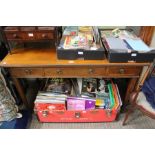 A 19th century mahogany and satin wood inlaid side table with three inline drawers