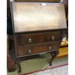 A first quarter 20th century fall front bureau with fitted interior