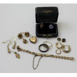 A collection of assorted jewellery items, includes some 9ct and a 14ct stone set ring, gross weight