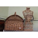 A picnic baskets, two other baskets and wicker manikin