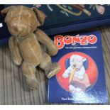 A vintage 'Bonzo' toy and a book thereon