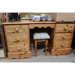 A pine desk / dressing table together with stool