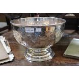 A silver plate large punch bowl, hand chased