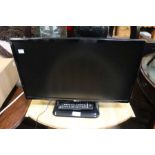 An LG flat screen television 22 inch with remote