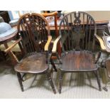 A pair of wheel back carver chairs