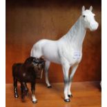 Two Beswick horses, to include one large dappled