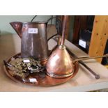 A collection of metal wares includes funnels, sugar cutter tongs, jug, brass furniture escutcheons,