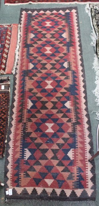 A geometric kilim runner 59 x 184 cm