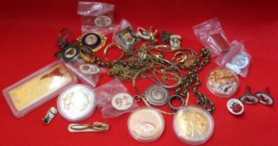 A bag containing of yellow metal jewellery, fobs, commemoratives, etc.