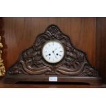 Ornate carved mantle clock