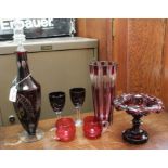Pieces of ruby flashed glass, comprising decanter, two wine glasses, comport, fluted cut vase & two