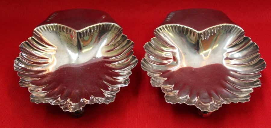 A pair of HM silver scallop shell dishes 142gms