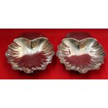 A pair of HM silver scallop shell dishes 142gms
