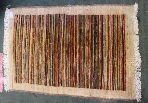 A modern striped woollen mat 59 x 85 cm