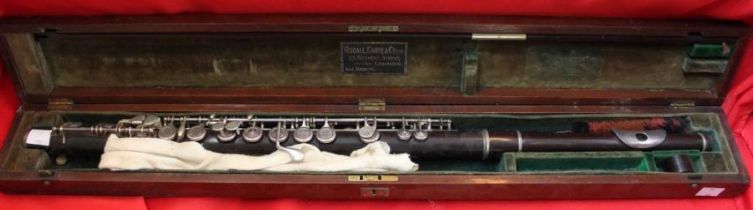 A Rudall, Carte & Co. Ltd, cased wooden flute, cased