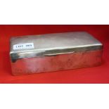 A hallmarked silver cigarette box with engine turned hinge lid 18.5 x 8.5 x 5.5 cm