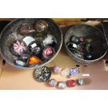 A collection of decorative containers and paperweights