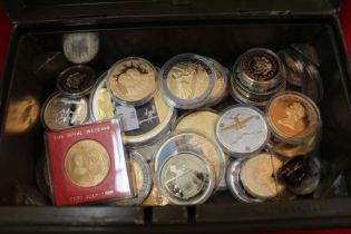 A lockable box containing a mixture of commemoratives, yellow metal fob (A/F), with key