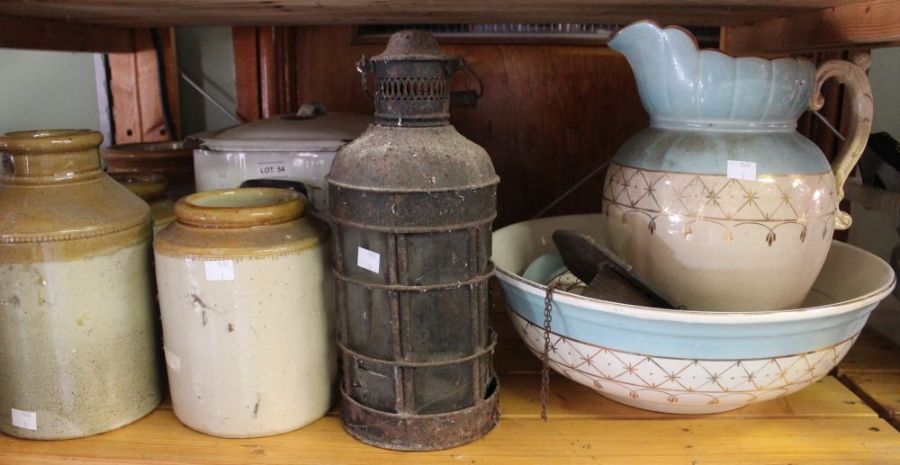A pottery wash bowl set, lantern, enamel bread bin, four stoneware jars and a small wall clock