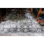 Machine made floral floor rug 142 x 260cm