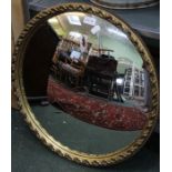 Gilt framed convex wall mirror