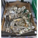 A box tray of plated flatware to include many silver teaspoons