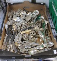 A box tray of plated flatware to include many silver teaspoons