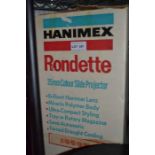 A "Hanimex Rondette" slide projector in original box