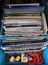 A crate of assorted motoring magazines and other related literature