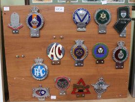A presentation board of mounted metal motor club badges, Bugatti Owners amongst various others